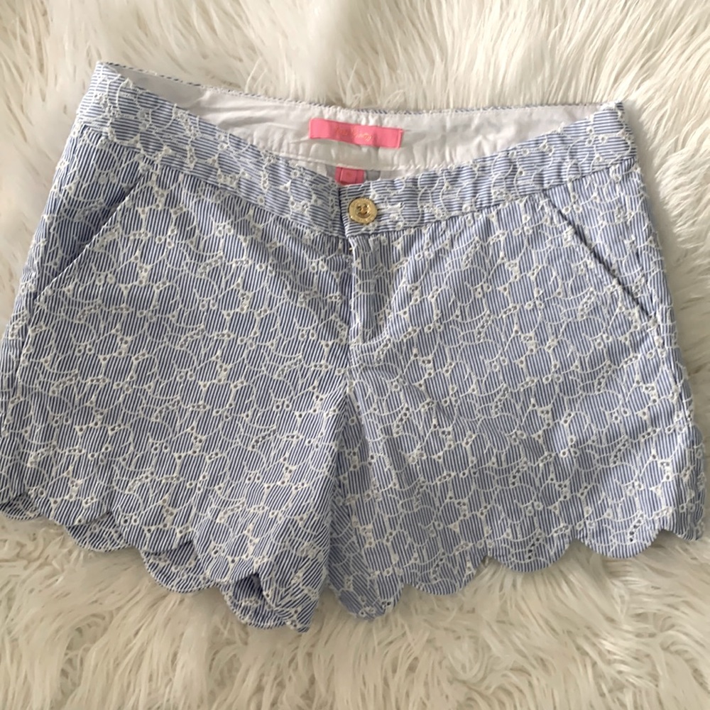Lilly Pulitzer blue and white striped shorts with scalloped bottom.